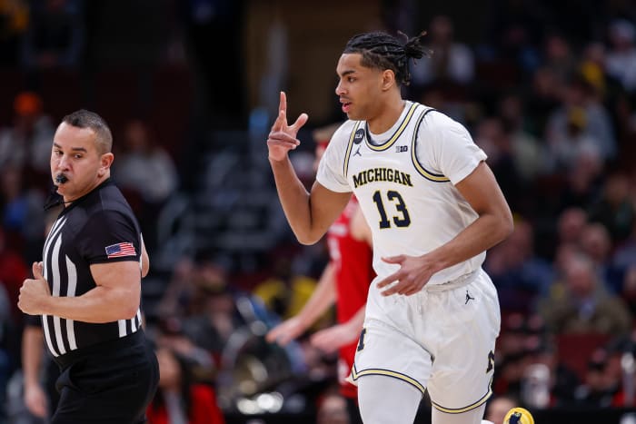 Michigan Wolverines guard Jett Howard (13) reacts after scoring against the Rutgers Scarlet Knights during the first half at United Center.